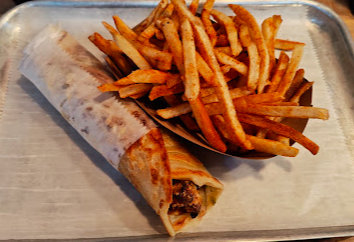The Kati Roll Company signature dishes Chicken Tikka Roll
Aloo Masala Roll
Achari Paneer Roll